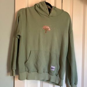 Thick sage green sweatshirt with beautiful cherry blossom tree embroidered.